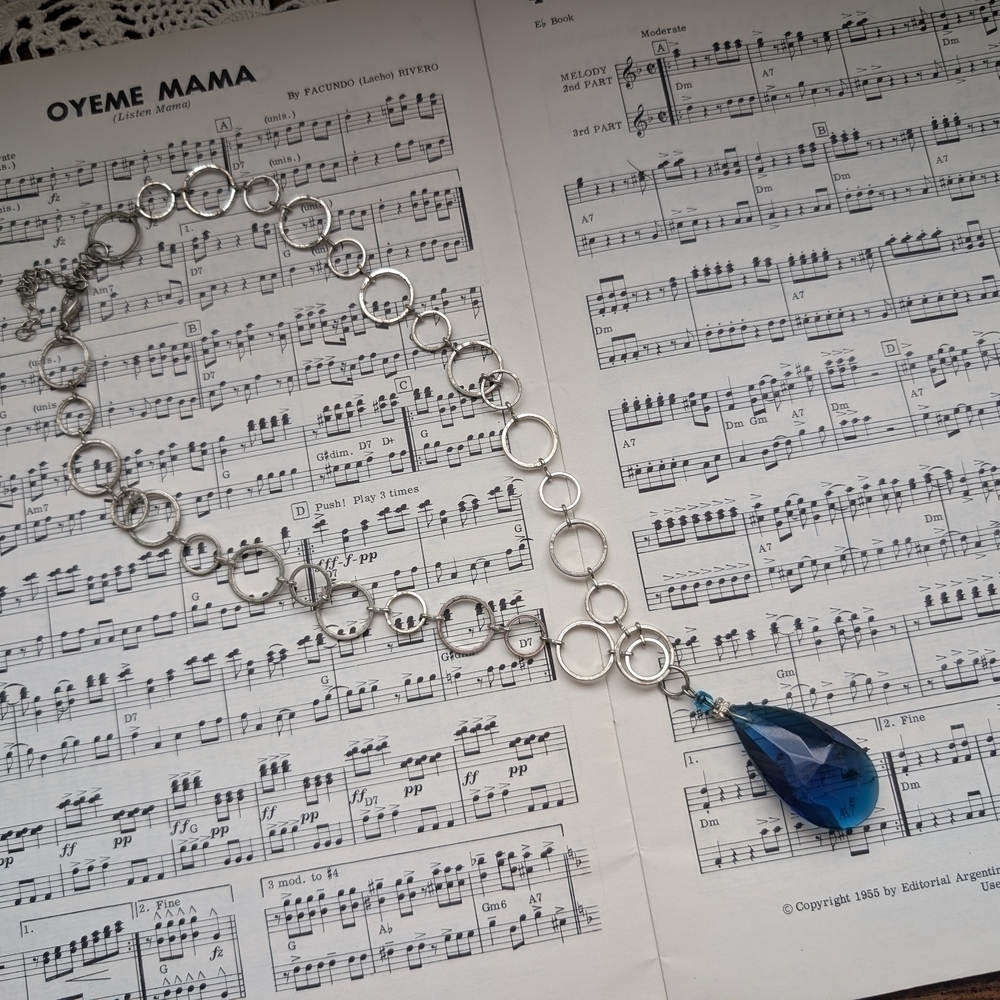 Elegant Silver Necklace with Blue Pendant